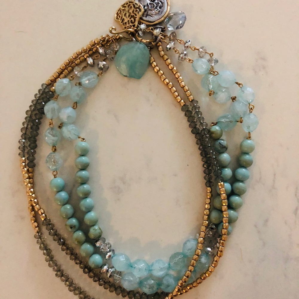 gold and blue necklace